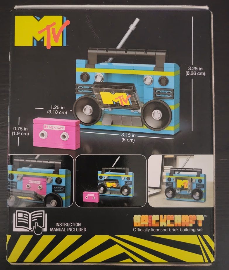 Reverse side of the building toy box showing the assembled boombox in different pictures.